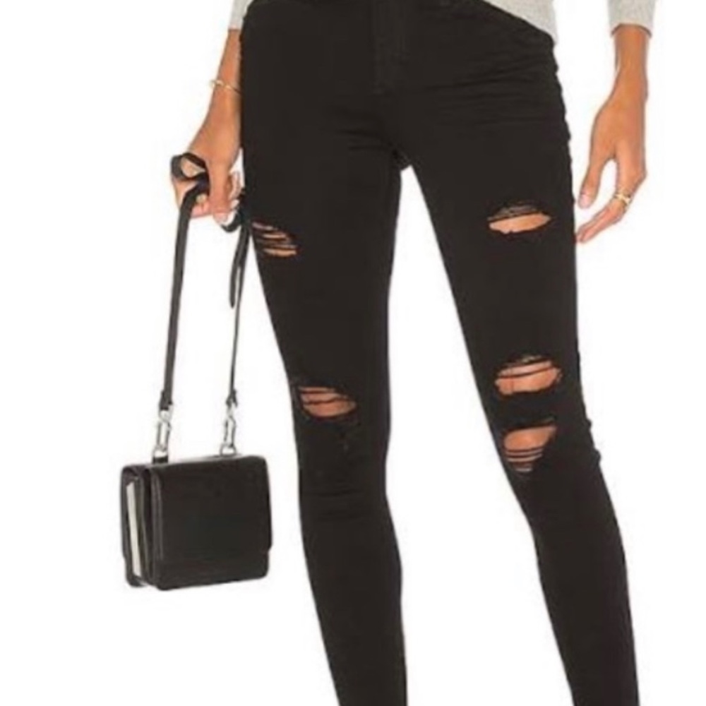 Black distressed mid rise skinny ankle jeans